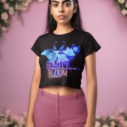 Black "Beauty in Bloom Tee" in Extra Small size featuring a chic blue butterfly and blooming roses design, symbolizing nature's elegance and transformation.