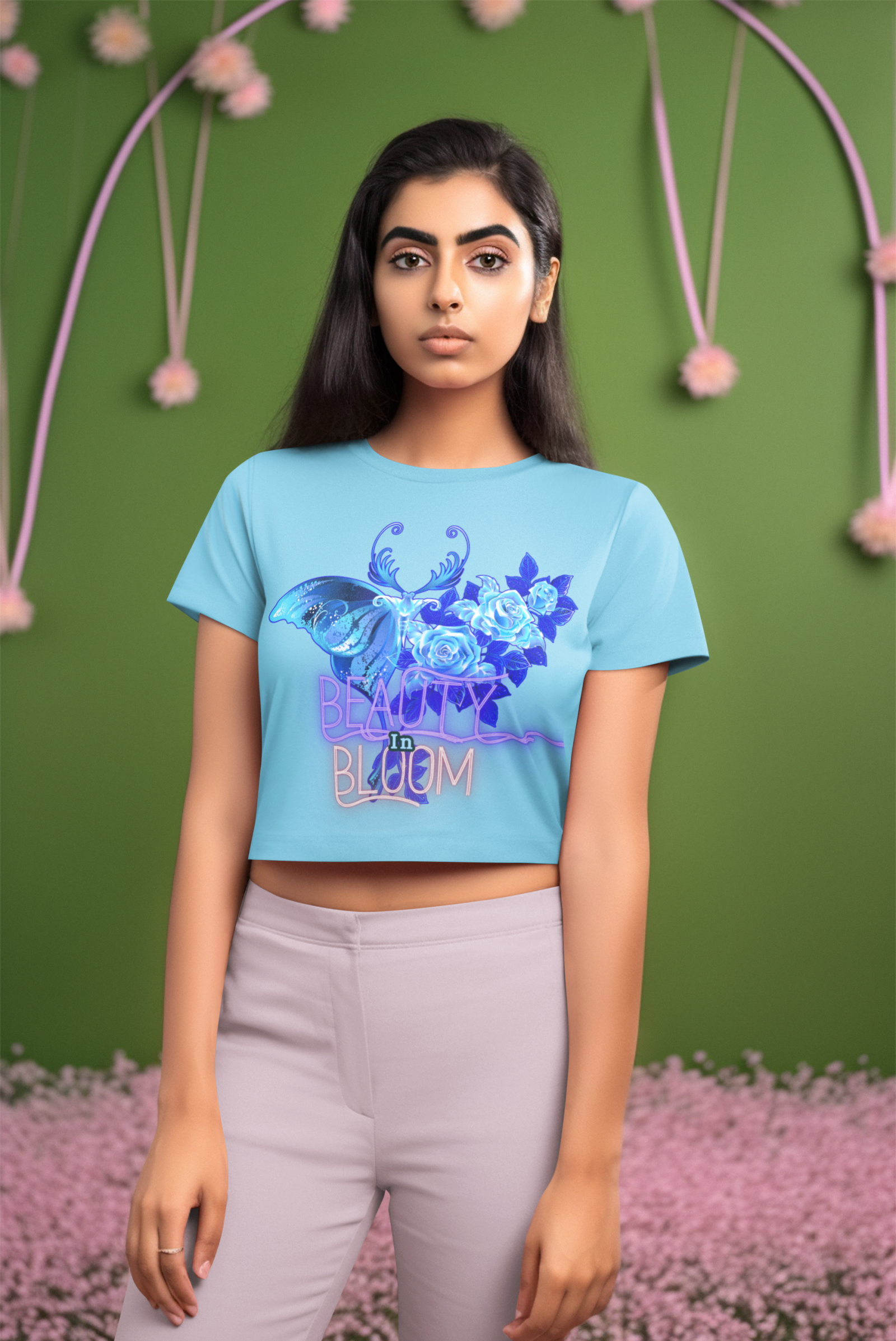 Beauty in Bloom Tee Chic Rose & Butterfly Design PodLyft SkyBlue Medium – Elegant sky blue crop top adorned with a detailed butterfly and floral motif. Represents growth, beauty, and style, perfect for modern fashion.