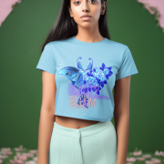 Beauty in Bloom Tee Chic Rose & Butterfly Design PodLyft SkyBlue Small – Stylish sky blue crop top with intricate butterfly and blooming rose artwork, offering a blend of beauty and sophistication. Great for casual outings and unique styling.