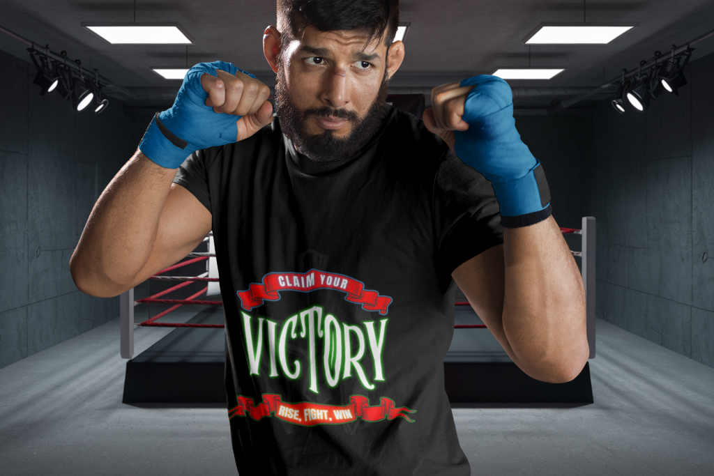 Claim Your Victory Tee modeled by a determined boxer in a black t-shirt featuring the motivational 'Rise, Fight, Win' design, set against a boxing ring background.
