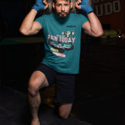 Petrol Blue Gym Motivation T-Shirt | Pain Today, Power Tomorrow by PodLyft in size Small, perfect for fitness enthusiasts seeking inspiration during workouts.
