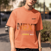 Medium-sized coral 'Bold Next Generation Leader' tee with a powerful leadership statement. A stylish and confident wear choice from PodLyft.