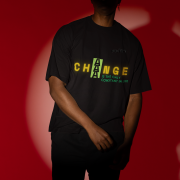 Small-size 'Change is Constant' Tee in Black – A motivational oversized t-shirt with striking typography in yellow and green. Made with 100% super-combed cotton (240 GSM), bio-washed for durability and comfort.