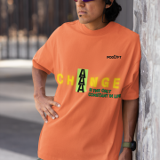 Double Extra Large 'Change is Constant' Tee in Coral – A standout oversized tee with motivational typography in yellow and green. Made from premium 240 GSM bio-washed cotton, ensuring softness and durability.
