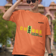 Large Coral 'Change is Constant' Tee – A motivational oversized t-shirt with a vibrant yellow-green design. Crafted from 240 GSM 100% super-combed cotton, pre-shrunk and bio-washed for maximum comfort