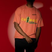 Small-size 'Change is Constant' Tee in Coral – A motivational oversized tee featuring dynamic typography in yellow and green. Made from 240 GSM super-combed cotton, ensuring premium comfort and longevity.