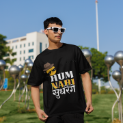 Black Small t-shirt with a cheeky emoji character in sunglasses and a fedora, alongside bold Hindi-English typography. Perfect for adding a fun, rebellious touch to your look!
