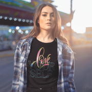Black cotton crop top with an inspiring "Love Yourself" design, blending artistic brushstrokes and modern outlined typography. Soft and breathable fabric