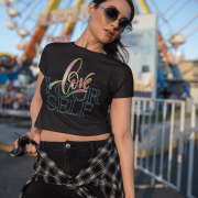 Women's black crop top with an empowering "Love Yourself" message in artistic typography. Soft, breathable, and ideal for casual and trendy looks.