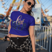 Trendy navy blue crop top with an inspiring "Love Yourself" message, combining artistic brushstroke textures with a sleek neon glow. Perfect for a bold and confident look.
