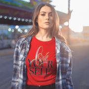 Red cotton crop top with an inspiring "Love Yourself" design, blending artistic brushstrokes and modern outlined typography. Soft and breathable fabric.