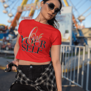 Women's red crop top with an empowering "Love Yourself" message in artistic typography. Soft, breathable, and ideal for casual and trendy looks.