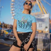 Soft and fashionable sky blue crop top with a unique "Love Yourself" print in shades of pink, green, and neon blue. A stylish way to embrace self-love and positivity.