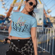 Stylish sky blue crop top with an empowering "Love Yourself" message in vibrant, artistic typography. Lightweight, breathable, and designed for confidence and comfort.