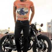 Coral Thrill Rider tee in extra small size, featuring a bold graphic of a fearless biker riding through a scenic backdrop. A must-have for adventure lovers and motorcycle enthusiasts, designed for comfort and style by PodLyft.