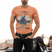 Coral Thrill Rider tee in small size, designed for bikers and road warriors. Showcasing a dynamic motorcyclist graphic with an adventurous theme, this tee is perfect for those who live for the thrill of the ride.