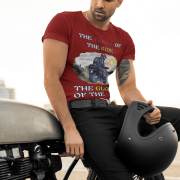 Medium-sized maroon Thrill Rider tee featuring a high-energy motorbike rider against a scenic outdoor backdrop. The bold typography and adventurous design make this an ideal tee for motorcycle lovers and thrill-seekers.