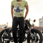 Olive green Thrill Rider tee in extra small size, featuring a bold graphic of a fearless biker riding through a scenic backdrop. A must-have for adventure lovers and motorcycle enthusiasts, designed for comfort and style by PodLyft.