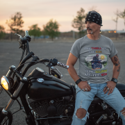 Double extra-large steel grey Thrill Rider tee, perfect for motorcycle enthusiasts who live for adventure. With its detailed biker design and striking typography, this tee makes a powerful statement for road warriors.