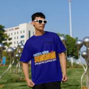 Stylish navy blue oversized T-shirt with a motivational quote 'CREATE YOUR SUNSHINE EVEN ON THE CLOUDIEST DAYS.' Contrasting sky-blue, orange/yellow, and white text with a sun icon. DTG-printed on premium 240 GSM cotton fabric. Large size.