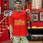 Red oversized T-shirt featuring a motivational 'CREATE YOUR SUNSHINE EVEN ON THE CLOUDIEST DAYS' design with sky-blue, orange/yellow, and white text. Includes a sun icon, DTG-printed on premium 240 GSM cotton fabric. Extra Small size.