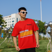 Stylish red oversized T-shirt with an inspiring 'CREATE YOUR SUNSHINE EVEN ON THE CLOUDIEST DAYS' design. Features sky-blue, orange/yellow, and white text with a sun icon. DTG-printed on durable 240 GSM cotton. Large size.
