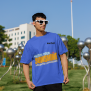 Stylish royal blue oversized T-shirt featuring a bold 'CREATE YOUR SUNSHINE EVEN ON THE CLOUDIEST DAYS' design. Bright sky-blue, orange/yellow, and white text with a sun icon. DTG-printed on durable 240 GSM cotton. Large size.