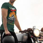 Extra-large bottle green Road Warrior tee with a striking motorcyclist design and bold lettering. This tee is crafted for those who live life on the open road, symbolizing determination, strength, and the thrill of the ride.