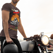 Extra-large coffee brown Road Warrior tee with a striking motorcyclist design, bold typography, and an eye-catching sunset. Perfect for riders who embrace adventure and live for the road, this tee is a statement of strength and determination.