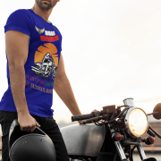 Extra-large navy blue Road Warrior tee with a striking motorcyclist design, bold typography, and an eye-catching sunset. Perfect for riders who embrace adventu
