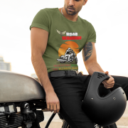 Double extra-large olive green Road Warrior tee, featuring a dynamic biker graphic against a blazing sunset. The bold "ROAD WARRIOR" text and motivational phrase add to the rebellious and adventurous biker spirit, making this tee a must-have for passionate riders.