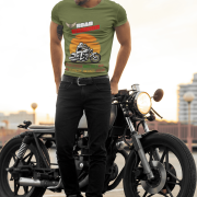 Medium-sized olive green Road Warrior tee featuring a dynamic motorcyclist riding through the open road against a vibrant sunset. The bold "ROAD WARRIOR" typography and motivational message symbolize resilience, freedom, and a fearless mindset.