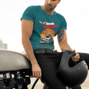 Double extra-large petrol blue Road Warrior tee, featuring a dynamic biker graphic against a blazing sunset. The bold "ROAD WARRIOR" text and motivational phrase add to the rebellious and adventurous biker spirit, making this tee a must-have for passionate riders.