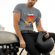 Double extra-large steel grey Road Warrior tee, perfect for passionate riders who live for the journey. With a bold design featuring a speeding biker, an orange sunset, and striking typography, this tee embodies the ultimate biker spirit.