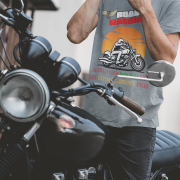 Steel grey Road Warrior tee in small size, designed for bikers who embrace the open road. Featuring a dynamic motorcyclist silhouette, bold typography, and an eye-catching sunset backdrop, this tee is perfect for those who live for adventure and freedom.