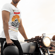 Extra-large white Road Warrior tee with a striking motorcyclist design, bold typography, and an eye-catching sunset. Perfect for riders who embrace adventure and live for the thrill of the road, this tee is a statement of strength and determination.