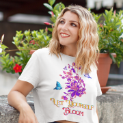 Model wearing a crisp white 'Bloom Yourself' T-shirt, decorated with a stunning floral and butterfly design. A fresh and timeless fashion piece, available at PodLyft.