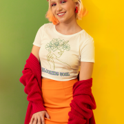 Minimalist and stylish, the 'Blooming Soul tee in beige complements any wardrobe with its elegant floral art design. Available at PodLyft