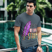 A stylish charcoal Write Your Story Tee designed with a creative feather quill and motivational typography. Perfect for those who take charge of their journey. Premium cotton by PodLyft.