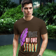 A unique coffee brown Write Your Story Tee featuring an artistic feather quill and a powerful message. Great for storytellers, achievers, and go-getters. Crafted by PodLyft.