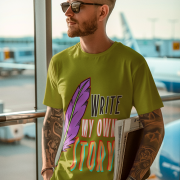 A nature-inspired olive green Write Your Story Tee with an artistic feather quill and a motivational typography design. Ideal for visionaries. Soft cotton fabric by PodLyft.