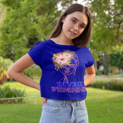 Woman in a deep navy blue 'Divine Feminine' T-shirt, adorned with an elegant floral line-art design. A bold and stylish look, available at PodLyft.