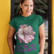 Bottle Green Inspirational Floral Tee with a beautifully illustrated woman and flowers, celebrating positivity with 'We Are All Wonderful.' A perfect blend of nature and motivation.