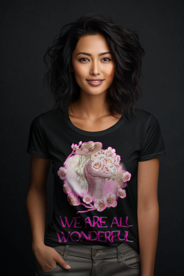 Inspirational Floral Tee featuring a watercolor-style design of a woman with long blonde hair holding pink flowers, surrounded by elegant floral elements and the uplifting quote 'We Are All Wonderful.' Perfect for those who love stylish and empowering fashion. Available at PodLyft