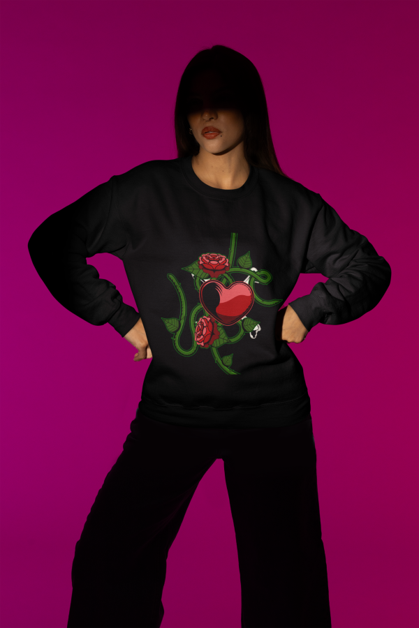 Bold and stylish Love Heart Sweatshirt in black, featuring a striking red heart entwined with green vines, roses, and a serpent—symbolizing love, strength, and beauty. A statement piece for any wardrobe. | PodLyft