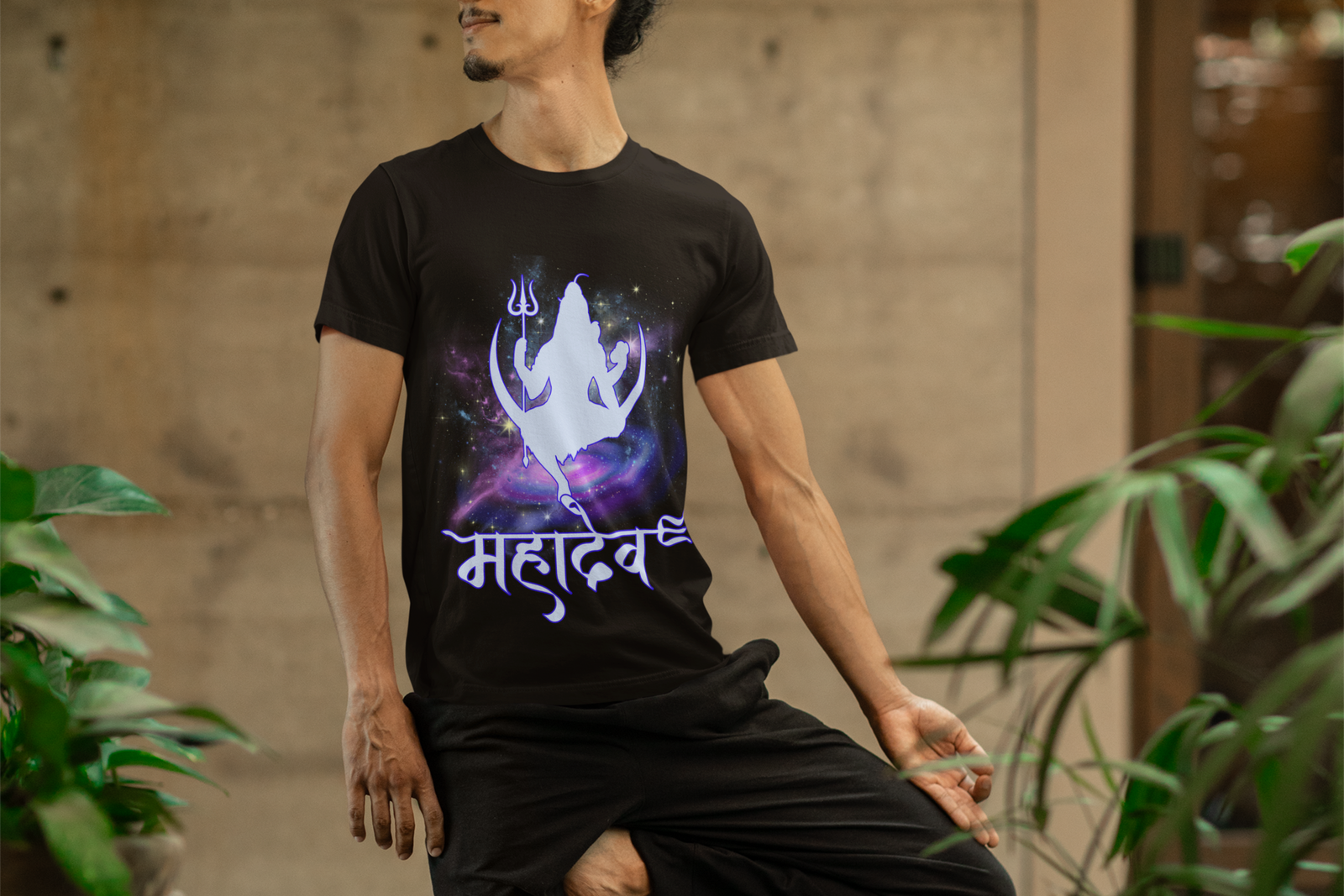 A stylish black Mahadev Cosmic Energy T-shirt featuring a cosmic Shiva silhouette with "महादेव" in Hindi. Perfect for spiritual seekers, yoga enthusiasts, and Shiva devotees. Made from premium cotton by PodLyft.