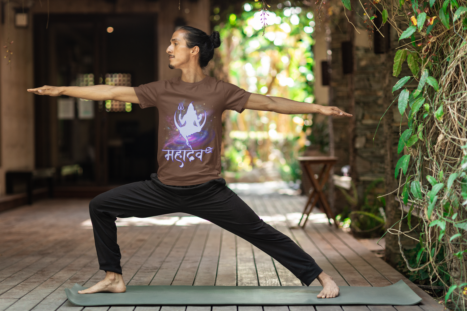 A premium coffee brown Mahadev Cosmic Energy T-shirt featuring a cosmic Lord Shiva silhouette and "महादेव" in Hindi. Perfect for yoga practitioners, meditation enthusiasts, and Shiva devotees. High-quality cotton by PodLyft.
