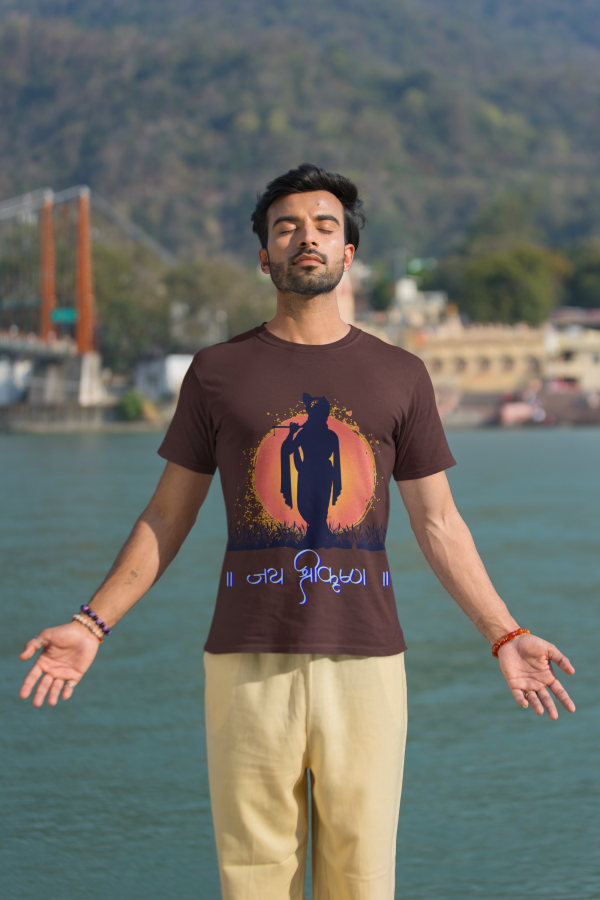 Spiritual Krishna Tee – A divine brown t-shirt featuring a serene silhouette of Lord Krishna against a radiant sunset, with 'जय श्रीकृष्ण' in elegant script. Perfect for spiritual and cultural expression. Available at PodLyft.