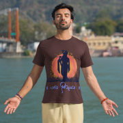 Spiritual Krishna Tee – A divine brown t-shirt featuring a serene silhouette of Lord Krishna against a radiant sunset, with 'जय श्रीकृष्ण' in elegant script. Perfect for spiritual and cultural expression. Available at PodLyft.
