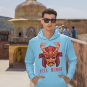 Men’s Fire Demon Samurai Hoodie by PodLyft in baby blue, on a mannequin, featuring a bold red and orange samurai helmet design with a demonic face and 'FIRE DEMON' text, displayed in a modern store with blurred clothing racks in the background.